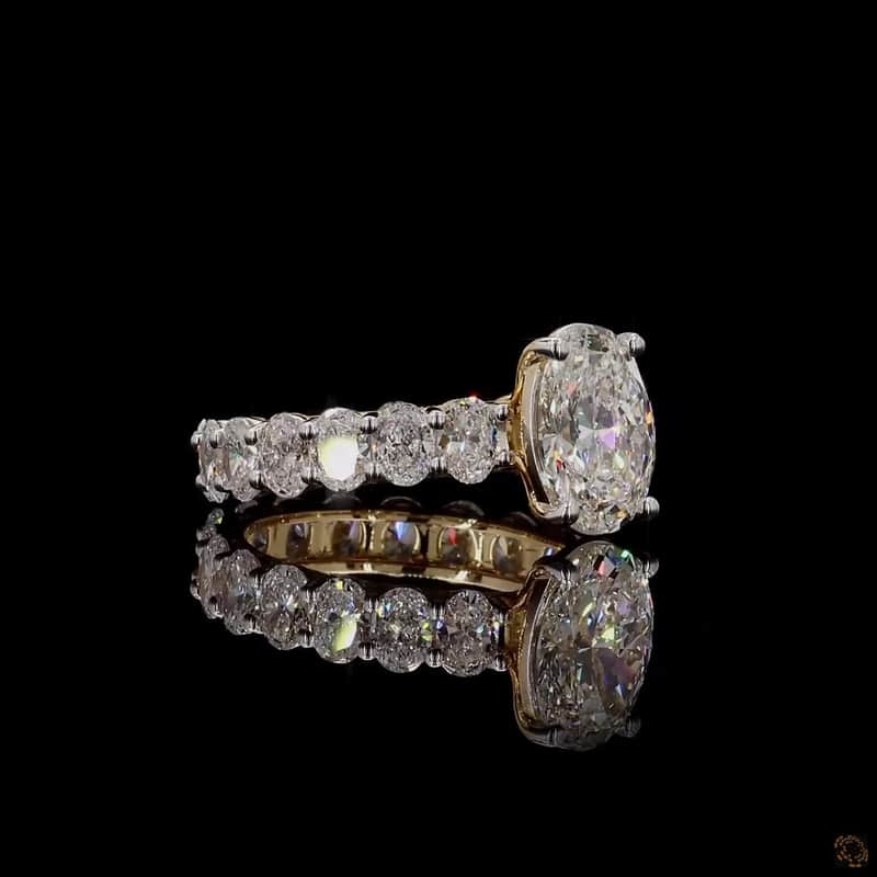 Oval Side-Stone Solitaire Ring 3