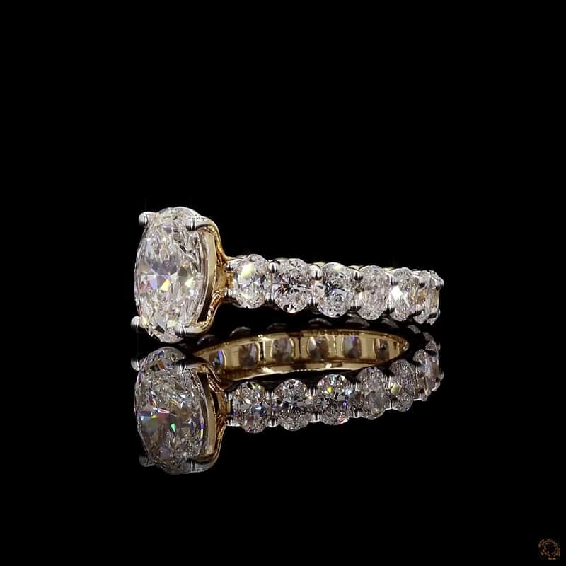 Oval Side-Stone Solitaire Ring 4