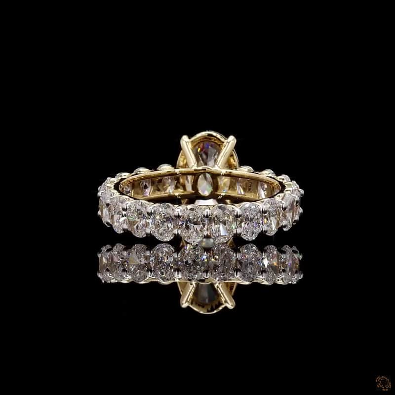 Oval Side-Stone Solitaire Ring 5