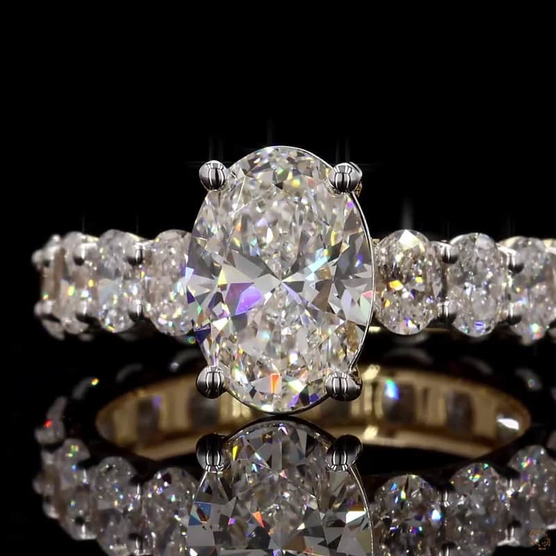 Oval Side-Stone Solitaire Ring 6